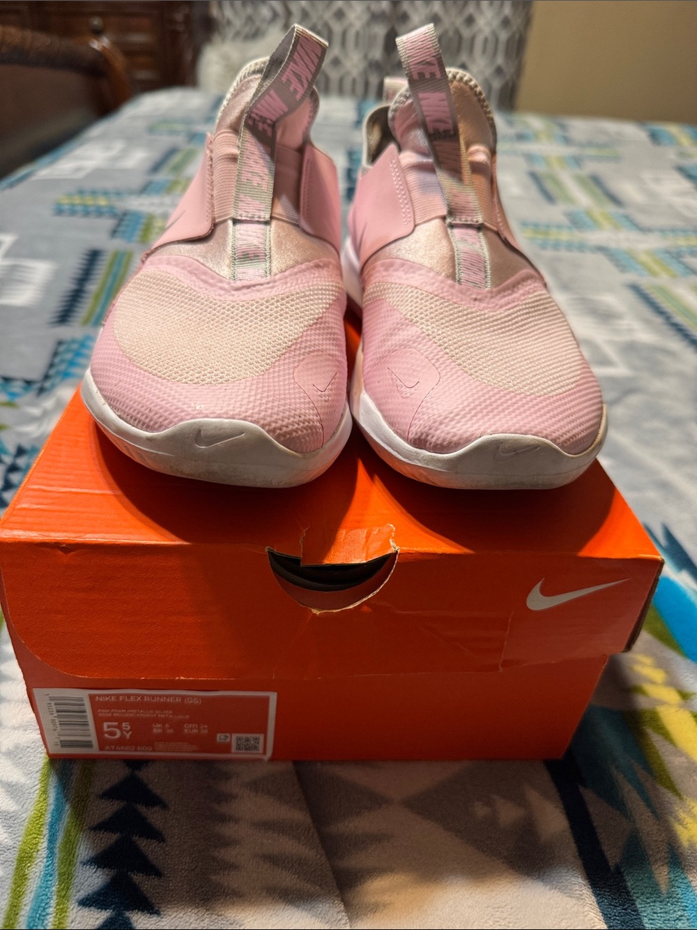 Youth  Pink Nike slip ons